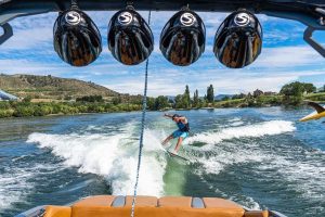 wakeboarder with wakeboard tower and Samson Sports speakers installed