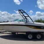 Boat with a custom collapsible wakeboard tower