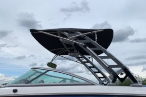 Closeup of an over-the-top bimini top for a wakeboard tower