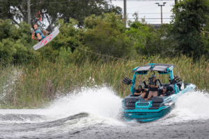 boat pulling a wakeboarder in the air at the Pro Wakeboard Tour (PWT)