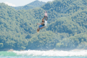 wakeboarder doing a flip in the air at the IWWF World Wakeboard Championships